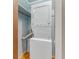 Laundry closet with stacked washer and dryer at 355 Hartford Ave, Daytona Beach, FL 32118