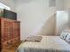 Bedroom featuring wooden floors, classic armoire, and a tv for relaxed viewing at 4073 N Chinook Ln, Ormond Beach, FL 32174