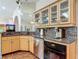 Well-lit kitchen features granite counters, stainless steel appliances, and ample cabinet space at 4073 N Chinook Ln, Ormond Beach, FL 32174