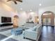 Living room features tile floors, a vaulted ceiling, and an open layout at 4073 N Chinook Ln, Ormond Beach, FL 32174