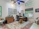 Inviting home office featuring a vaulted ceiling, a well-lit desk area, and tasteful decor for a productive workspace at 4073 N Chinook Ln, Ormond Beach, FL 32174