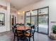 View of outdoor patio and pool from the dining area, offering indoor/outdoor living at 4073 N Chinook Ln, Ormond Beach, FL 32174