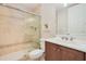 Bathroom features a tiled shower with glass doors, a vanity, and ample space at 4427 S Atlantic Ave, Port Orange, FL 32127