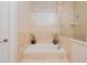 A beautifully-decorated bathroom with a soaking tub and tile accents at 4427 S Atlantic Ave, Port Orange, FL 32127
