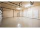 Expansive garage offering ample space, multiple doors, and a clean, painted floor at 4427 S Atlantic Ave, Port Orange, FL 32127