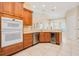 Modern kitchen with built in double oven, stainless steel dishwasher, and beverage cooler at 4427 S Atlantic Ave, Port Orange, FL 32127