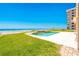 Inviting pool area overlooking the ocean, perfect for relaxation and enjoying the beach views at 4427 S Atlantic Ave, Port Orange, FL 32127