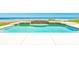 Relaxing pool featuring custom tile accents and direct views of the ocean and sandy beach at 4427 S Atlantic Ave, Port Orange, FL 32127
