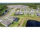 View the serene neighborhood, community ponds, and well-maintained homes from an aerial perspective at 460 Sarah Nicole Way, New Smyrna Beach, FL 32168