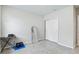 Flex room with sliding closet and tile floor, suitable for an office, gym, or play area at 460 Sarah Nicole Way, New Smyrna Beach, FL 32168
