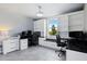 Spacious office with built-in shelving, desk and granite counters, perfect for a work-from-home setup at 460 Sarah Nicole Way, New Smyrna Beach, FL 32168