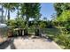 Enjoy the outdoors with a cozy backyard patio surrounded by lush greenery at 5 Greenfern Cir, Ormond Beach, FL 32174