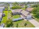 Spacious home features an attached two-car garage, nice front yard and a white fence at 5478 Landis Ave, Port Orange, FL 32127