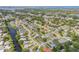 Neighborhood featuring neatly kept homes, green spaces, water, and a view of the city in the distance at 5478 Landis Ave, Port Orange, FL 32127