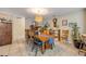 Dining area with a large wooden table, decor, and lots of seating at 5478 Landis Ave, Port Orange, FL 32127