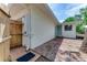 Exterior home feature of an outdoor shower with a wooden privacy screen for added convenience at 556 N Beach St, Ormond Beach, FL 32174