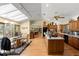 Bright kitchen features hardwood floors, a large island, and an open dining area at 5721 John Anderson Hwy, Flagler Beach, FL 32136