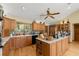 Kitchen featuring wood cabinets, hardwood floors, an island and lots of counter space at 5721 John Anderson Hwy, Flagler Beach, FL 32136