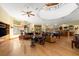 Expansive living room showcasing hardwood floors, a vaulted ceiling, and a wet bar for entertaining guests at 5721 John Anderson Hwy, Flagler Beach, FL 32136