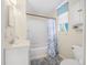 Cozy bathroom with a shower-tub combination, natural light, and modern fixtures at 61 E Bayshore Dr, Port Orange, FL 32127