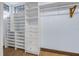 Walk-in closet with built-in shelving and drawers, offering ample storage space at 61 E Bayshore Dr, Port Orange, FL 32127