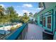 Relaxing deck overlooking the pool and garden, perfect for outdoor seating at 61 E Bayshore Dr, Port Orange, FL 32127