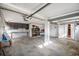 Large garage with workbench and overhead lighting provides ample space for projects and storage at 61 E Bayshore Dr, Port Orange, FL 32127