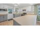 Well-equipped kitchen with modern appliances, ample counter space, and plenty of cabinet space at 61 E Bayshore Dr, Port Orange, FL 32127