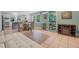 Inviting space with stylish furnishings, tiled flooring, and an adjacent kitchen area at 61 E Bayshore Dr, Port Orange, FL 32127