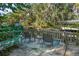 Backyard patio overlooking the water, complete with seating and lush greenery at 61 E Bayshore Dr, Port Orange, FL 32127