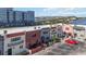 Aerial view showcases the townhouses with designated parking near a bridge at 625 N Halifax Ave # 11, Daytona Beach, FL 32118