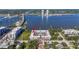Aerial view of waterfront townhome community, highlighting the pool and bay access at 625 N Halifax Ave # 11, Daytona Beach, FL 32118