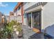 Serene backyard with plants and sliding doors leading to outdoor living space at 625 N Halifax Ave # 11, Daytona Beach, FL 32118