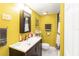 Bathroom with a modern vanity, ample counter space, and bright lighting at 625 N Halifax Ave # 11, Daytona Beach, FL 32118
