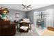 Cozy bedroom featuring neutral tones, comfortable furnishings, and natural light at 625 N Halifax Ave # 11, Daytona Beach, FL 32118