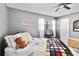 Charming bedroom featuring cozy decor, soft lighting, and a comfortable bed at 625 N Halifax Ave # 11, Daytona Beach, FL 32118