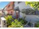 Beautiful landscaped entrance with well-maintained garden, stone pathway, and stylish front door at 625 N Halifax Ave # 11, Daytona Beach, FL 32118
