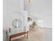 Bright dining room featuring carpeted flooring and a traditional chandelier at 700 Spring Cavern Ave, Orange City, FL 32763