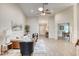 Spacious living room with a vaulted ceiling, neutral tones, and modern furnishings at 706 Fox Tail Ct, New Smyrna Beach, FL 32168
