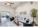 Bright and airy living room with views to the dining area, bedroom and comfortable seating at 706 Fox Tail Ct, New Smyrna Beach, FL 32168