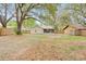 Spacious backyard with a screened patio, offering a view of the fenced perimeter at 910 Sheeler Oaks Dr, Apopka, FL 32703
