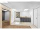 Finished basement with a sink and cabinets, plus a separate storage area at 910 Sheeler Oaks Dr, Apopka, FL 32703