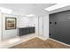 Finished basement area features a sink, cabinets, and a separate storage room at 910 Sheeler Oaks Dr, Apopka, FL 32703