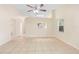 Spacious living room features tile floors and an open layout at 910 Sheeler Oaks Dr, Apopka, FL 32703