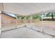 A spacious screened patio offers a great view to a fenced backyard at 910 Sheeler Oaks Dr, Apopka, FL 32703