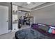 Modern bedroom with sleek furniture, workspace, and a comfortable bed at 920 Trafalgar St, Deltona, FL 32725