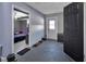 Bonus room featuring access to a bedroom, exit door and storage space at 920 Trafalgar St, Deltona, FL 32725