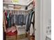 Walk-in closet with ample storage space for clothing and accessories; it's well-organized and spacious at 920 Trafalgar St, Deltona, FL 32725
