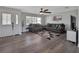 Cozy living room with wood floors, comfortable seating, and a bright, airy feel at 920 Trafalgar St, Deltona, FL 32725