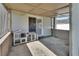 Enclosed patio with a pet house and concrete flooring at 920 Trafalgar St, Deltona, FL 32725